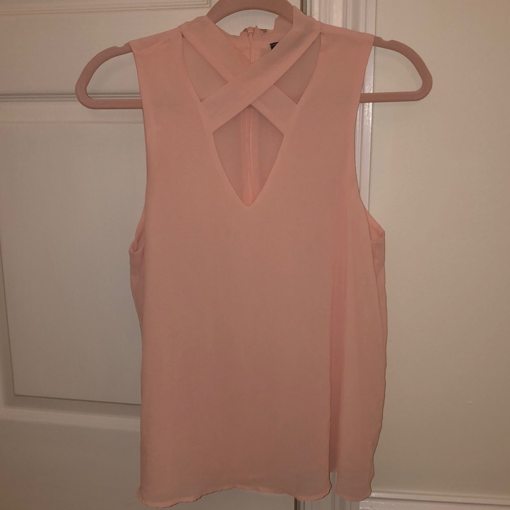 light pink criss cross blouse